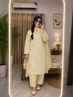 Yellow color long kameez with trouser and dubata