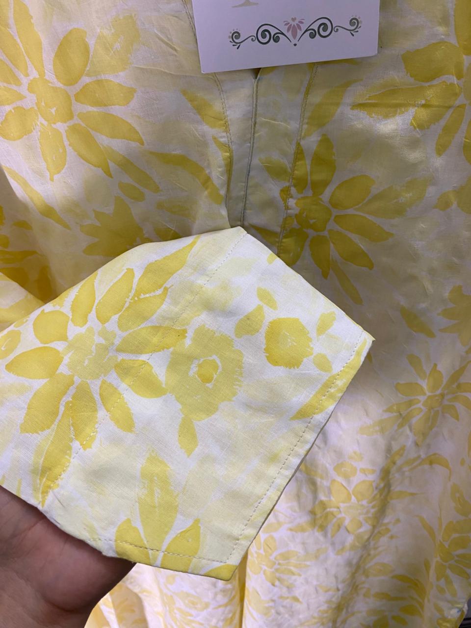 Yellow color long kameez with trouser and dubata