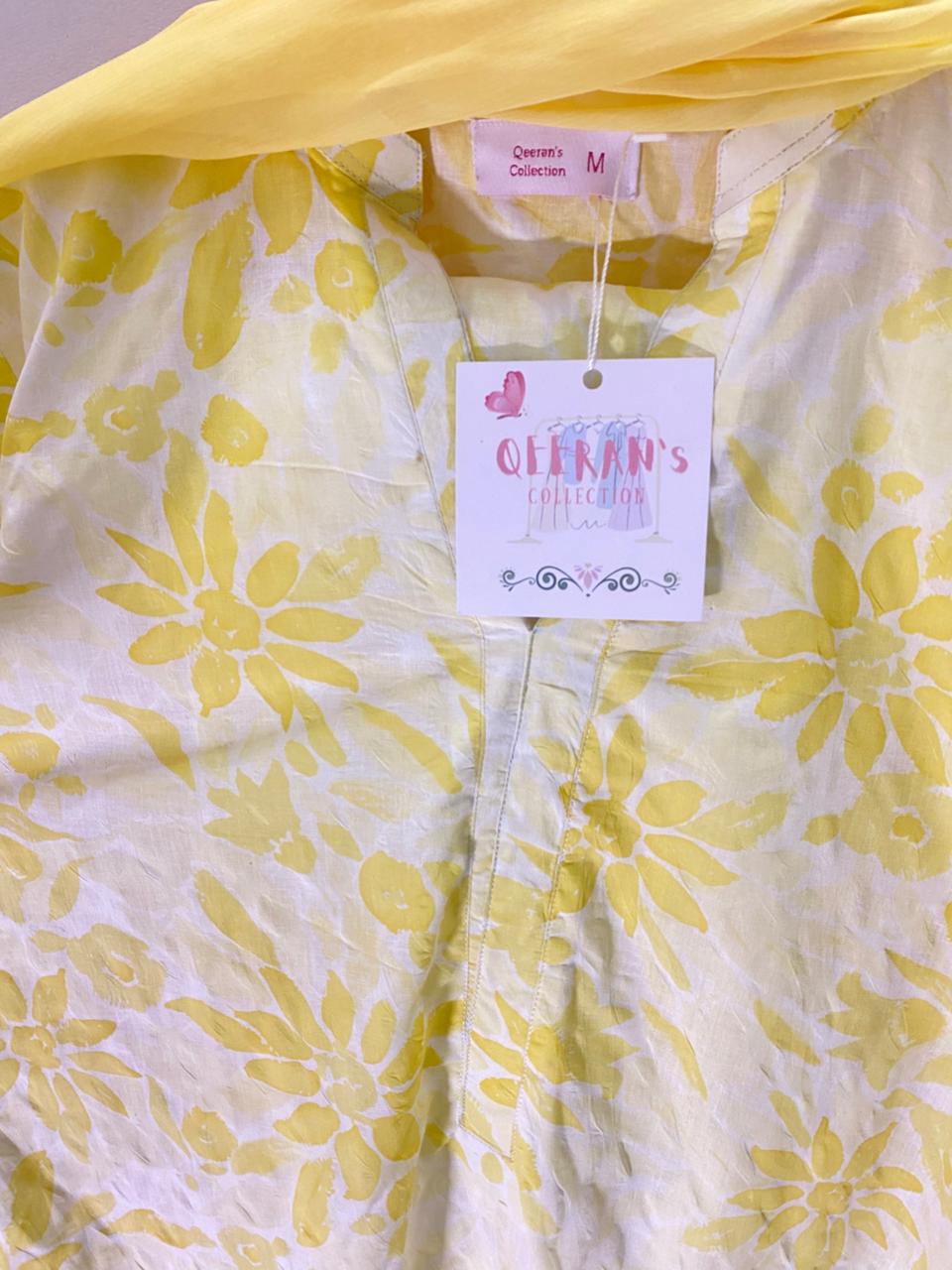 Yellow color long kameez with trouser and dubata