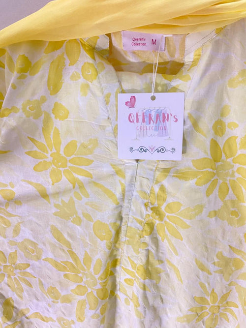 Yellow color long kameez with trouser and dubata